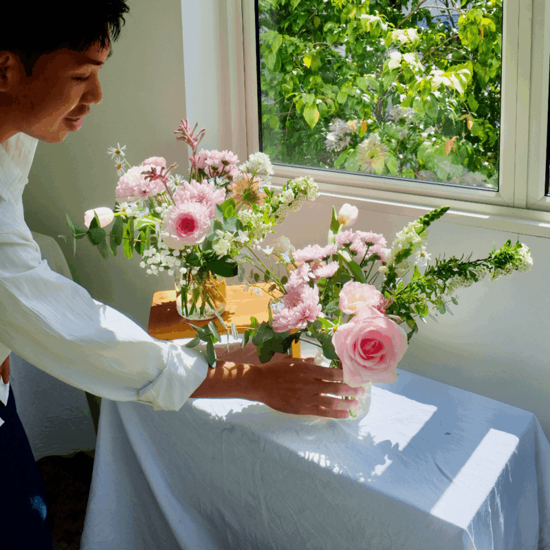a boyfriend doing flower arrangement